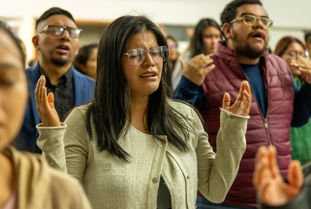 Women singing an anthem in church for Christ